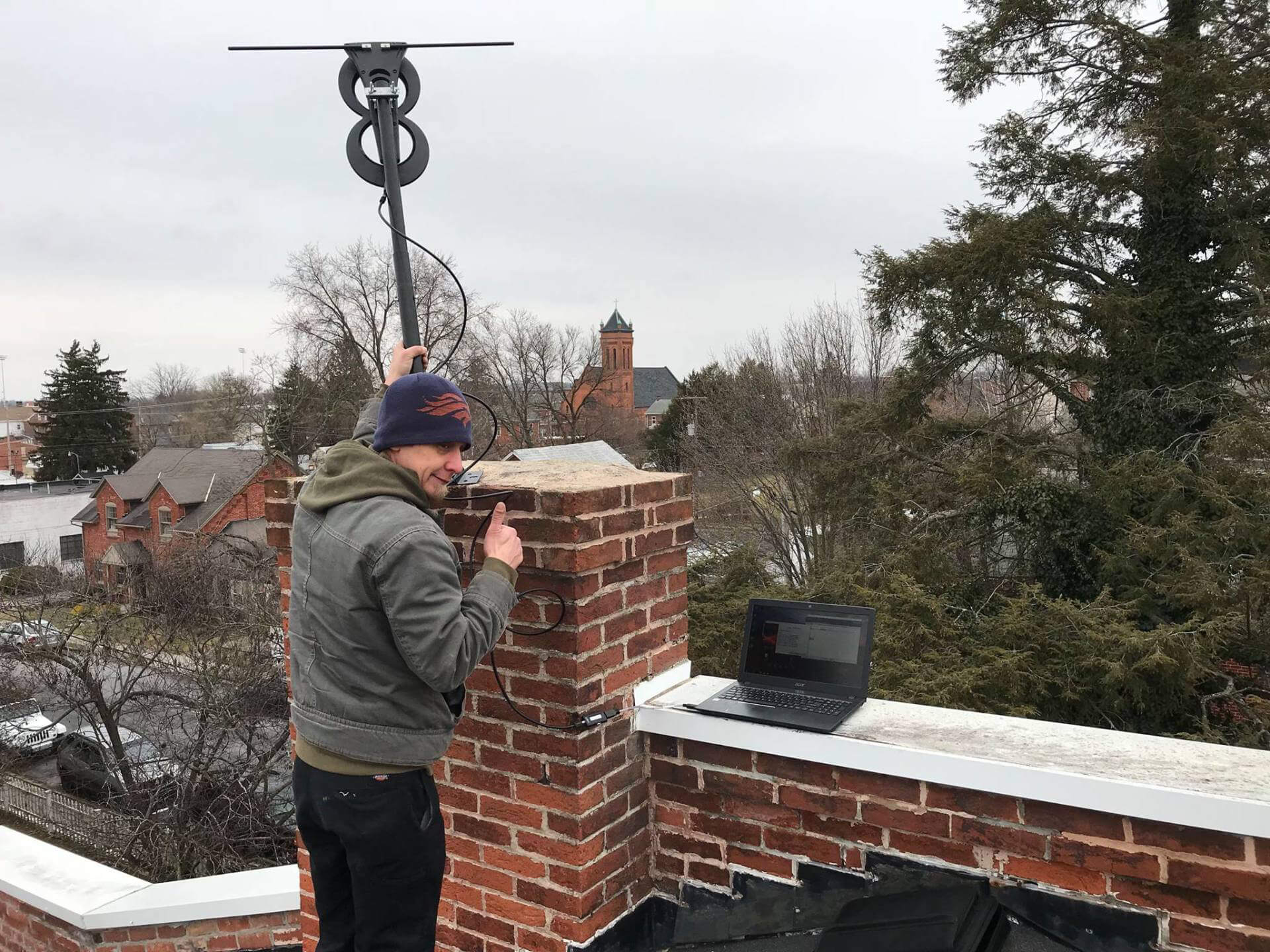 Residential antenna chimney installation